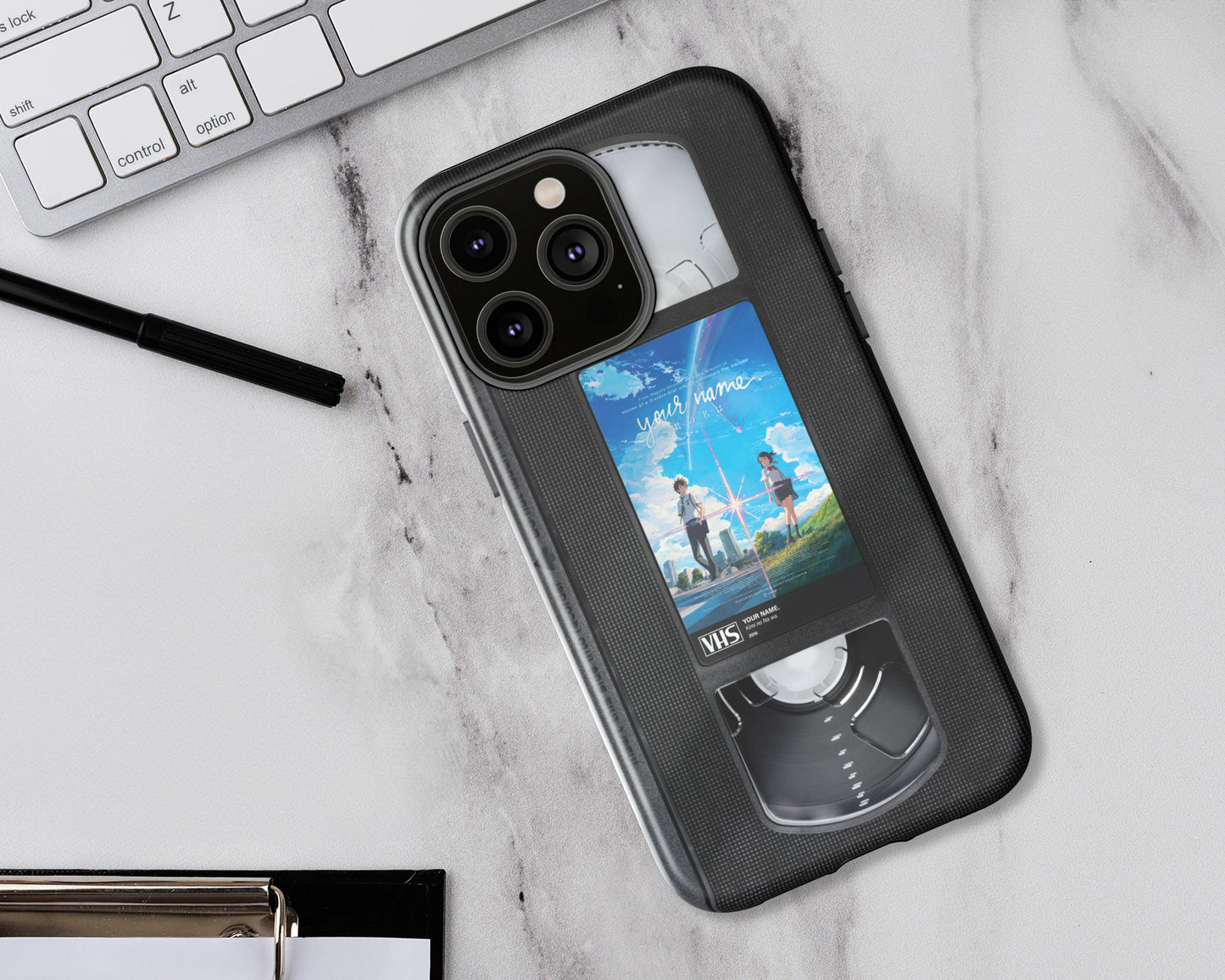 Anime poster label on VHS tape iPhone case