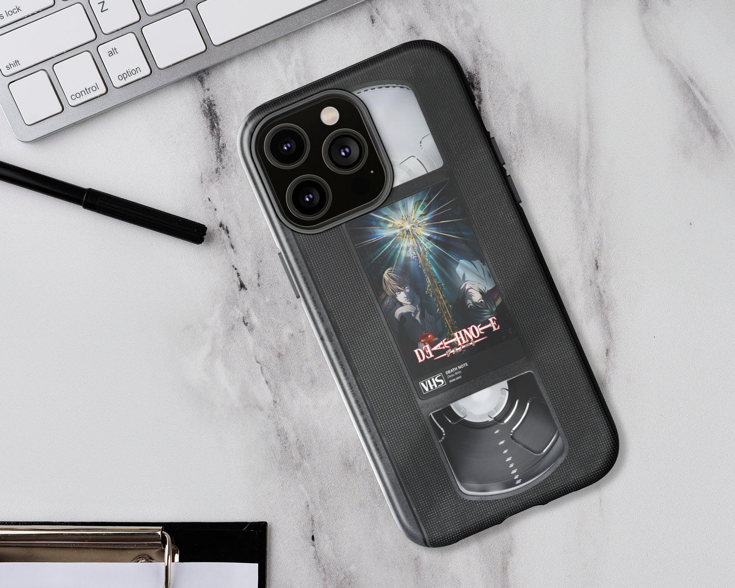 Anime poster label on VHS tape iPhone case