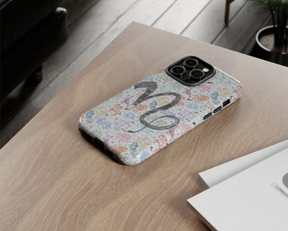 Capricorn Zodiac sign colorful drawings on notebook iPhone case