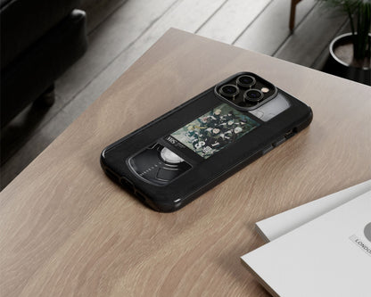 Anime poster label on VHS tape iPhone case